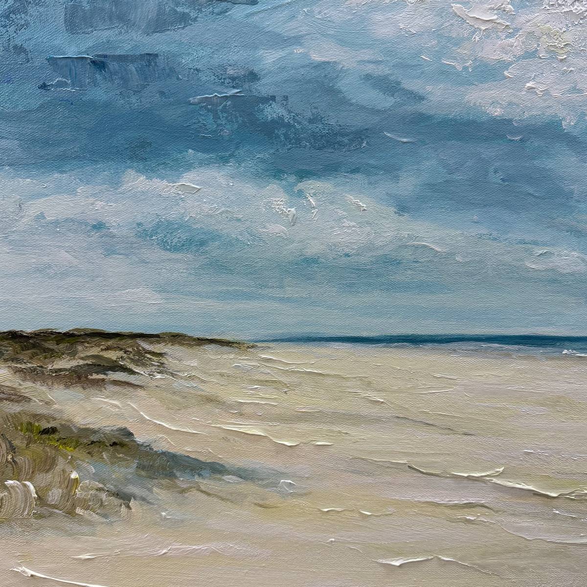 Seaside Serenity hand-painted ocean blue, ivory and soft neutral tones textured coastal landscape painting shown with silver frame