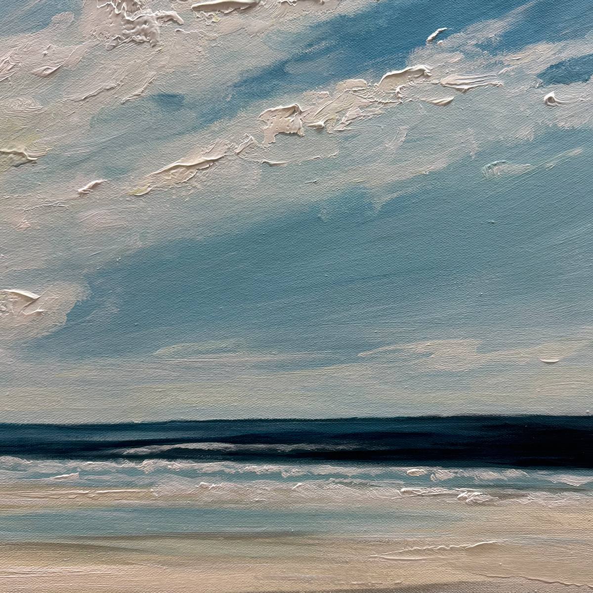 Seaside Serenity hand-painted ocean blue, ivory and soft neutral tones textured coastal landscape painting shown with wood frame