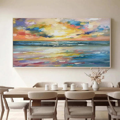 Seaside Sunset Serenade hand-painted ocean blue, ivory and soft neutral tones textured sunset seascape painting shown with gold frame
