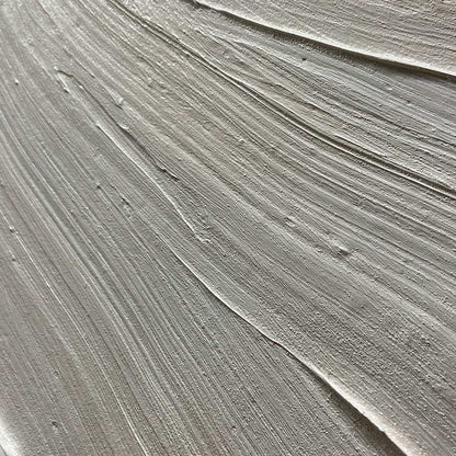 Serene Ripples hand-painted white and soft beige textured coastal abstract painting shown with silver frame