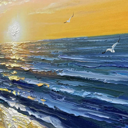 Sunkissed Shores hand-painted yellow and orange textured sunset seascape painting shown with silver frame