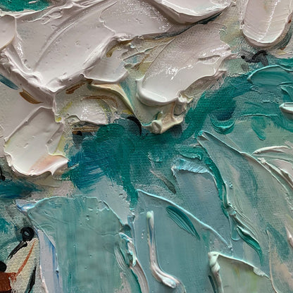 Surf's Up hand-painted ocean blue, ivory and soft neutral tones textured surfer ocean painting shown with black frame