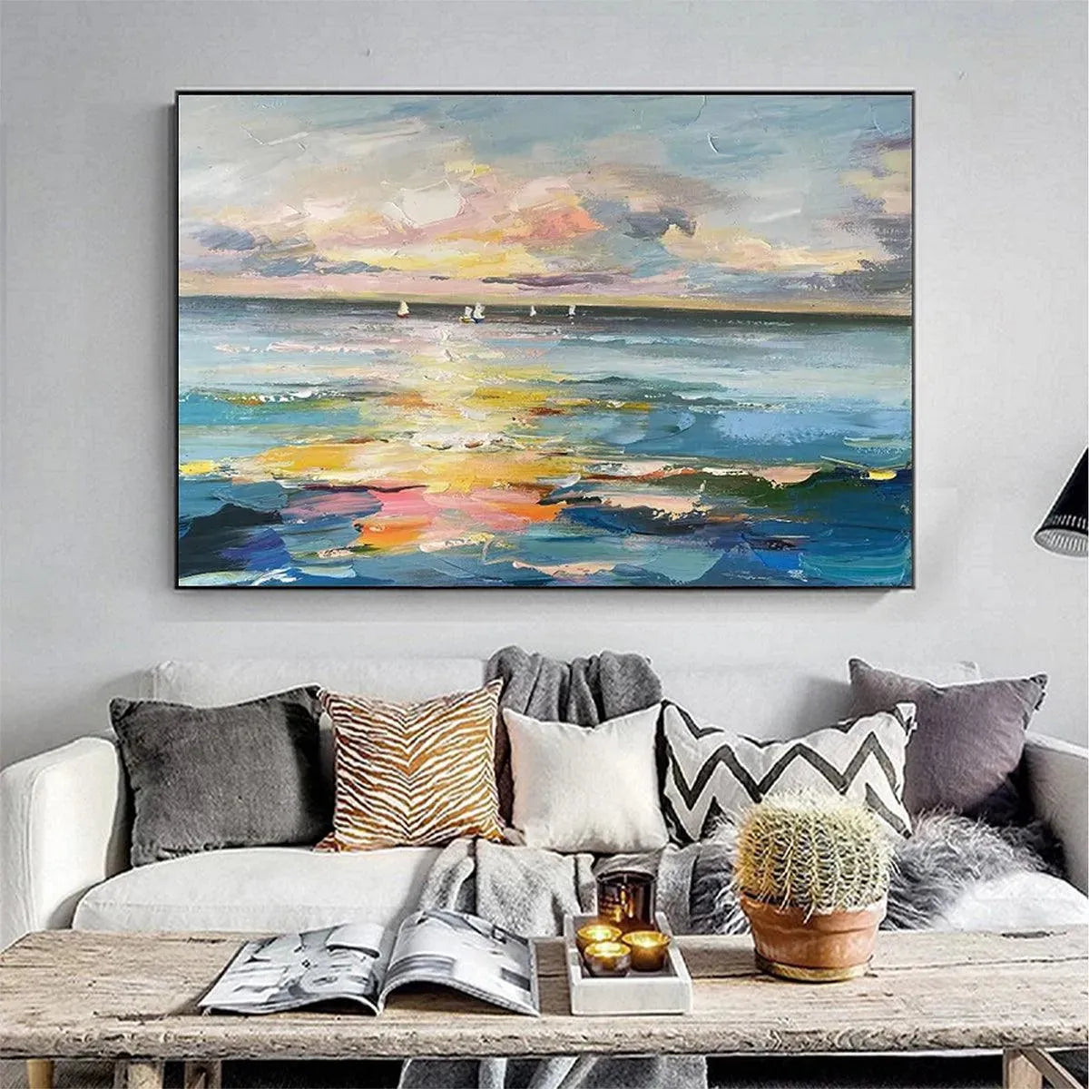 Sunset Sail hand-painted ocean blue, ivory and soft neutral tones textured sailboat seascape painting shown with gold frame