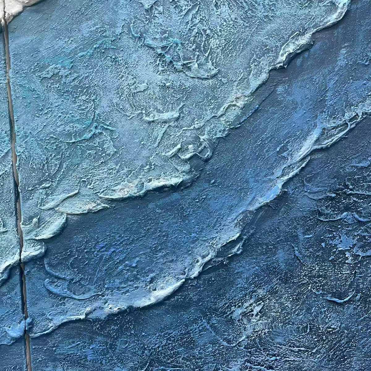 Textured Oceanscape Triptych hand-painted white and ocean blue textured coastal abstract painting shown with silver frame