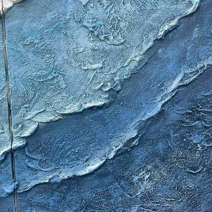 Textured Oceanscape Triptych hand-painted white and ocean blue textured coastal abstract painting shown with silver frame