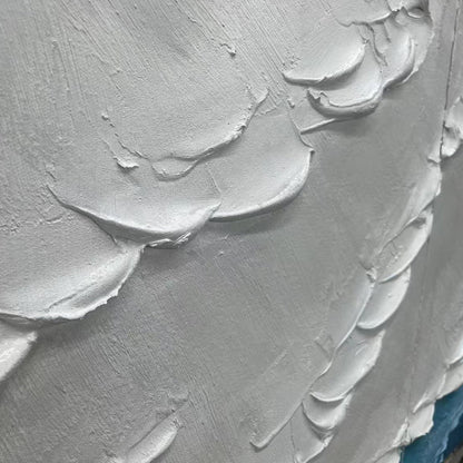 Textured Oceanscape Triptych hand-painted white and ocean blue textured coastal abstract painting shown with wood frame
