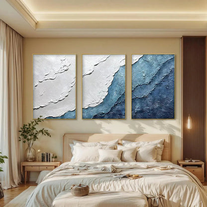Textured Oceanscape Triptych hand-painted white and ocean blue textured coastal abstract painting shown with white frame