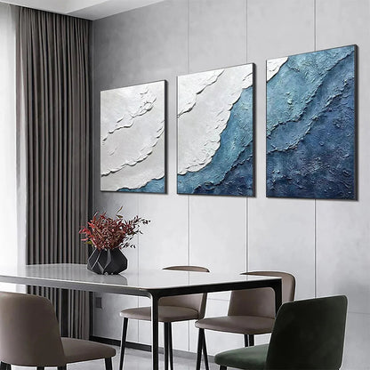 Textured Oceanscape Triptych hand-painted white and ocean blue textured coastal abstract painting shown as stretched canvas