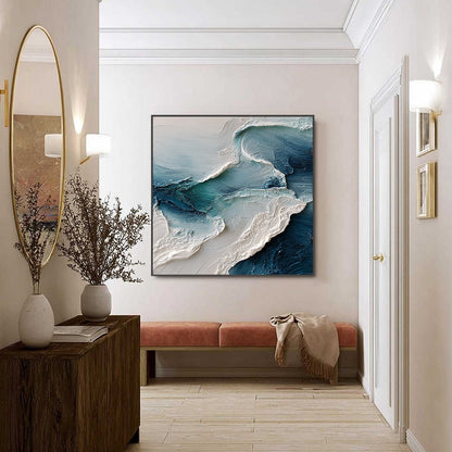 Tidal Rhythm hand-painted ocean blue, ivory and soft neutral tones textured ocean wave painting shown with silver frame