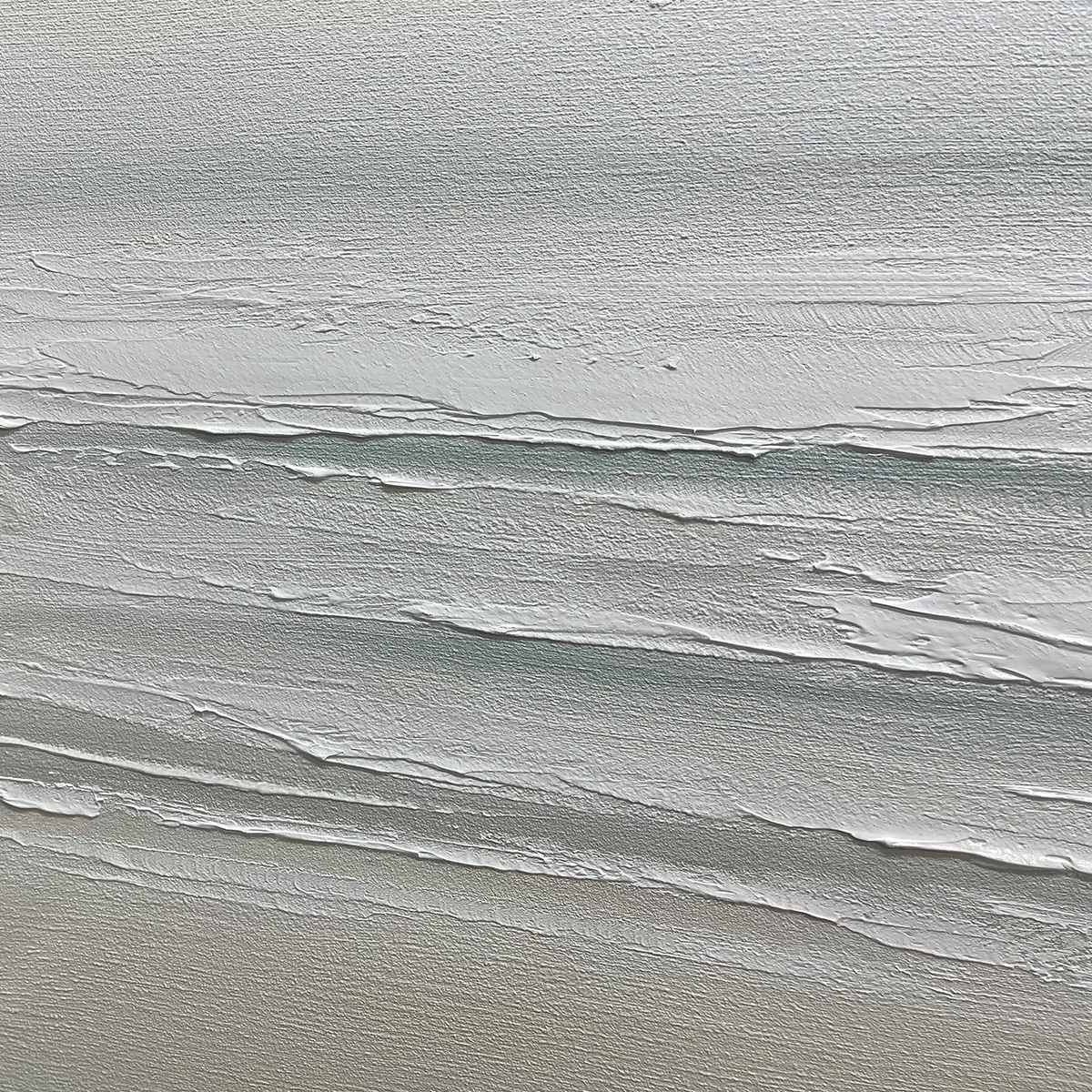 Tranquil Coast hand-painted ocean blue, ivory and soft neutral tones textured coastal landscape painting shown with silver frame