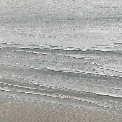 Tranquil Coast hand-painted ocean blue, ivory and soft neutral tones textured coastal landscape painting shown with silver frame