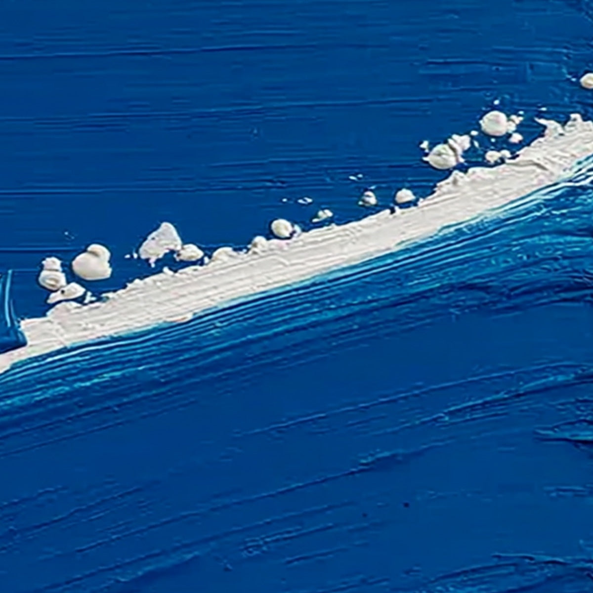 Voyage hand-painted white and ocean blue textured ocean wave painting shown with white frame