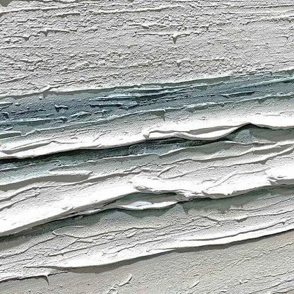 Whispering Tide hand-painted sand, soft grey and ocean blue textured beach scene painting shown with silver frame