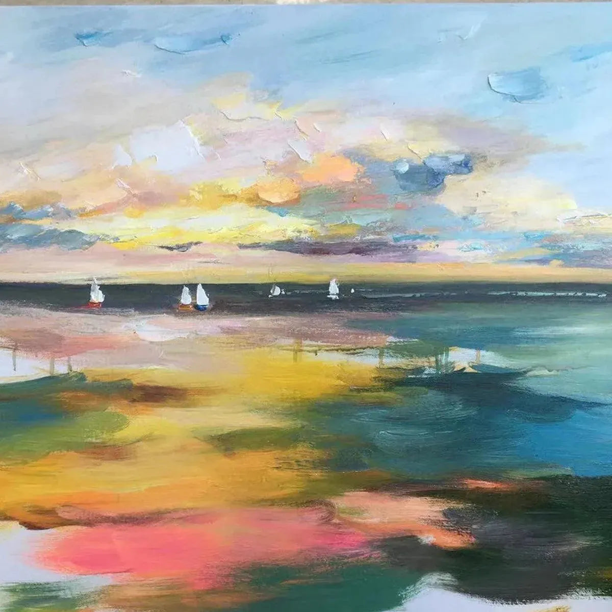 Sunset Sail hand-painted ocean blue, ivory and soft neutral tones textured sailboat seascape painting shown with wood frame