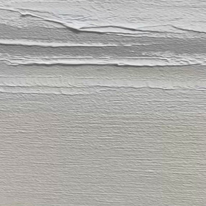 Tranquil Coast hand-painted ocean blue, ivory and soft neutral tones textured coastal landscape painting shown with gold frame