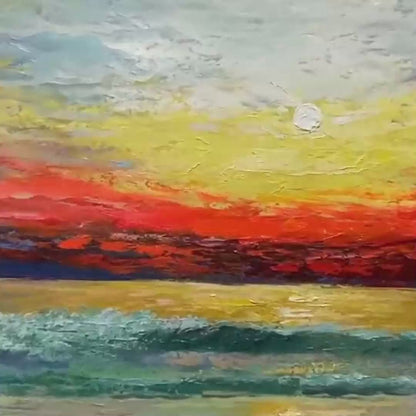 Fiery Kiss hand-painted ocean blue, ivory and soft neutral tones textured sunset seascape painting shown with gold frame