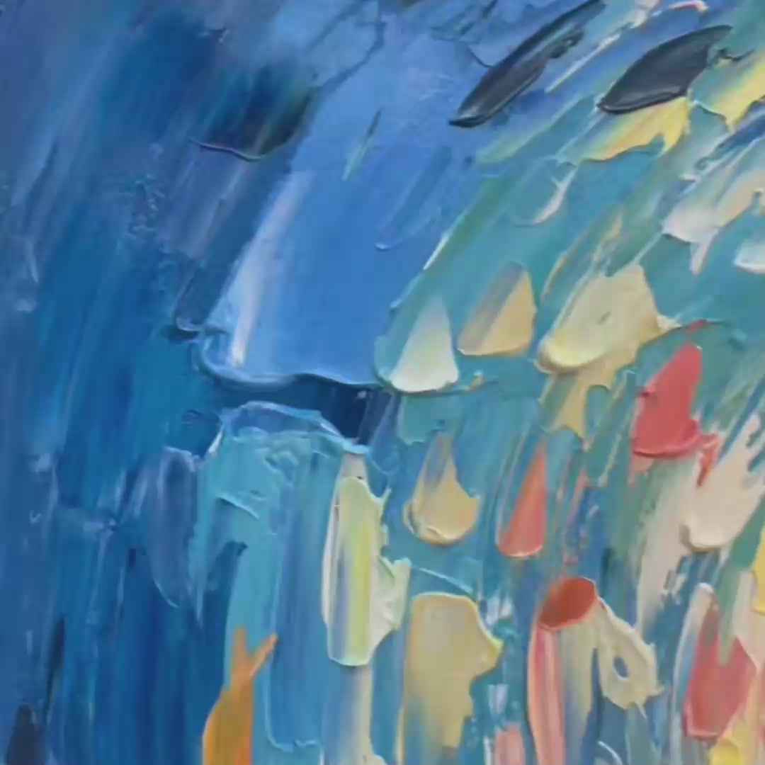 Ocean’s Grace hand-painted gold and coral textured school of fish painting shown with gold frame