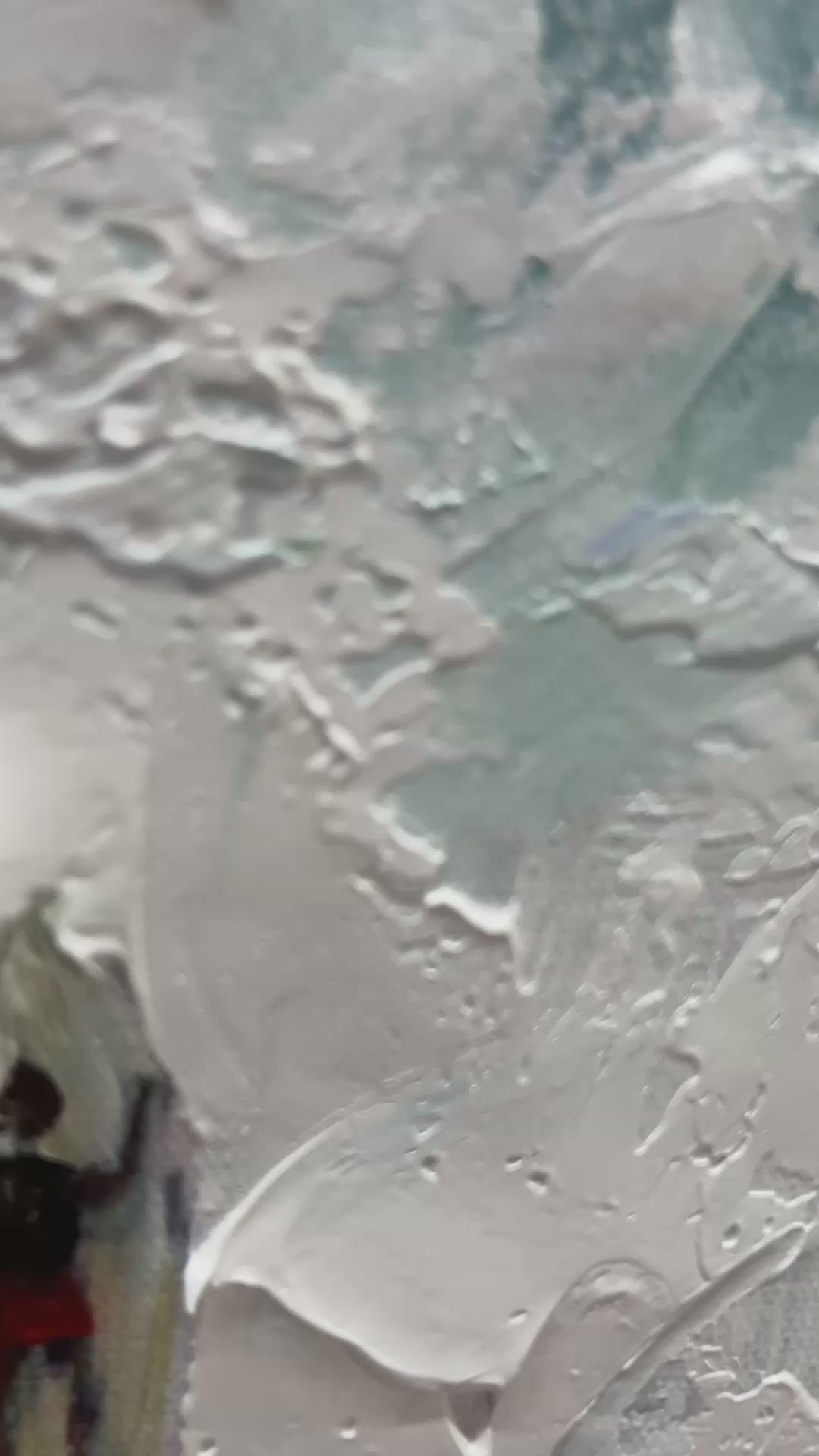 Catching The Wave hand-painted white and ocean blue textured surfer ocean painting shown with silver frame