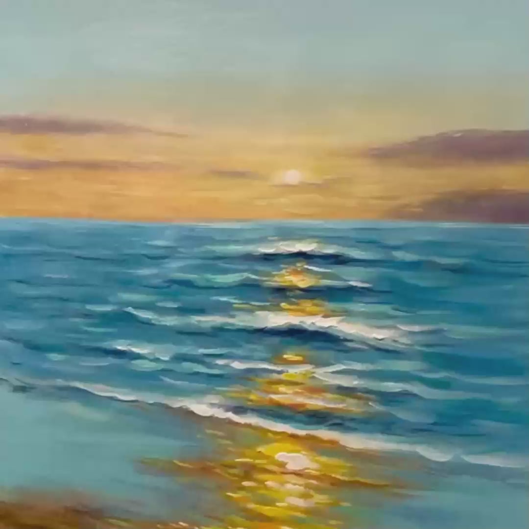 Sunkissed Shores hand-painted ocean blue, ivory and soft neutral tones textured sunset seascape painting shown with gold frame