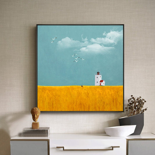 May include: A painting of a white lighthouse with a red roof on a yellow field with a blue sky and white clouds. There are birds flying in the sky.