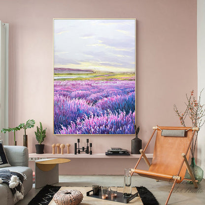 May include: A painting of a field of purple lavender flowers with a lake and hills in the background. The sky is a light blue with white clouds.