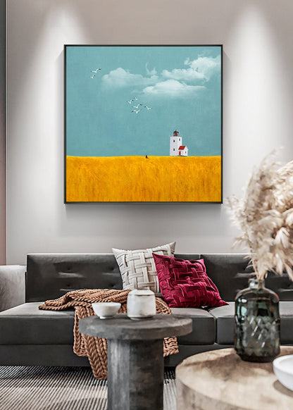 May include: A painting of a white lighthouse with a red roof on a yellow field. The sky is blue with white clouds and there are birds flying in the sky.
