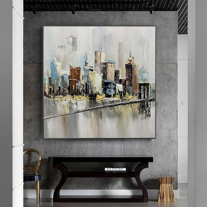 May include: Abstract painting of a cityscape with a bridge over a river. The painting is done in shades of gray, brown, and blue. The cityscape is reflected in the water.