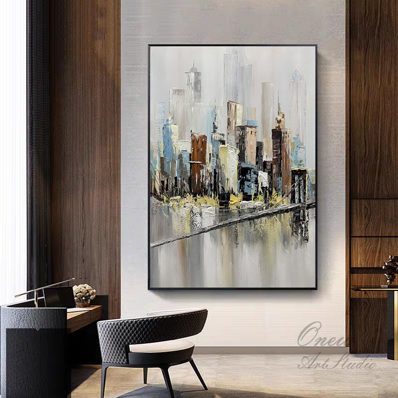 May include: Abstract painting of a cityscape with a bridge in the foreground. The painting is done in shades of gray, blue, brown, and yellow. The cityscape is depicted in a stylized manner, with the buildings appearing as blocks of color.