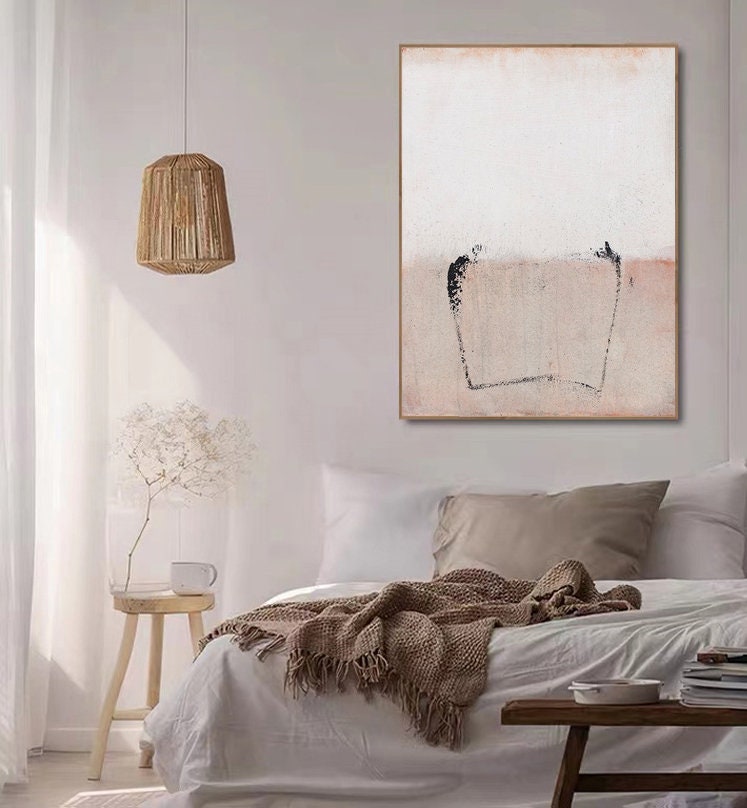 May include: A minimalist abstract painting with a white background and a light pink bottom half. A black line forms a rectangle shape in the center of the painting.