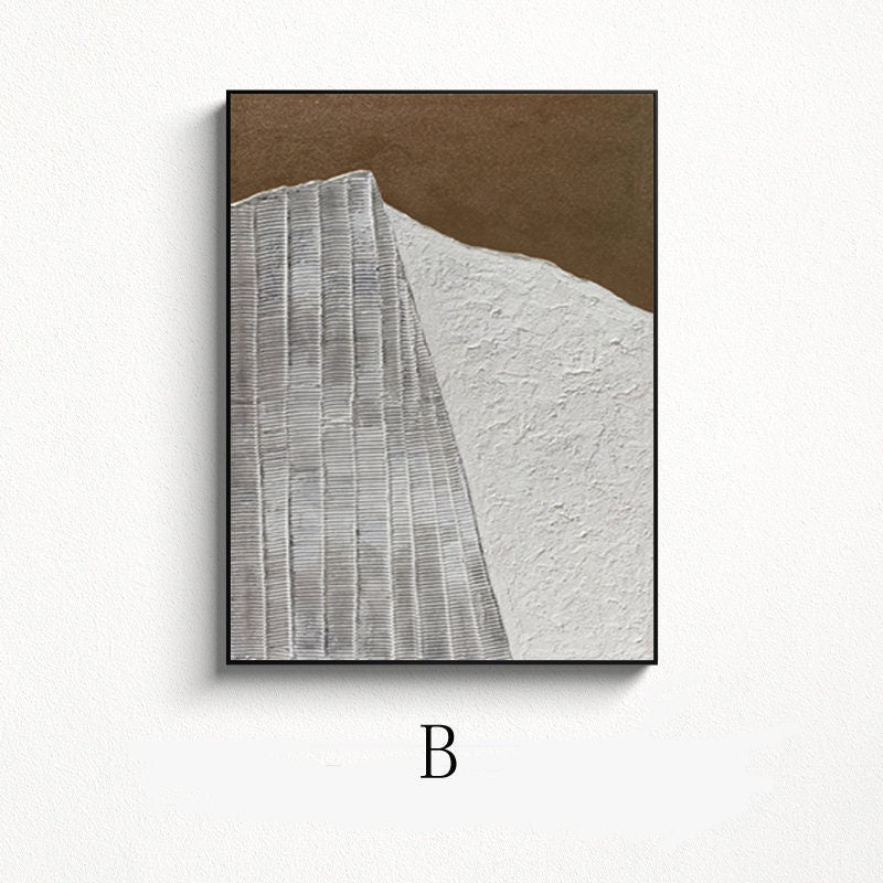 May include: Abstract art print with a white and gray geometric design on a brown background. The print is framed in a black frame.