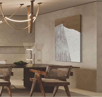 May include: A modern dining room with a wooden table and chairs. The table has a dark wood finish and the chairs have woven seats. A large abstract painting hangs on the wall behind the table. The painting is in shades of brown, white, and gray.