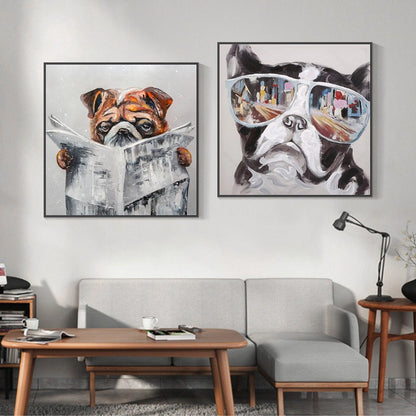 May include: Two framed paintings of dogs. The painting on the left shows a brown and white bulldog reading a newspaper. The painting on the right shows a black and white bulldog wearing sunglasses with a city reflected in the lenses.