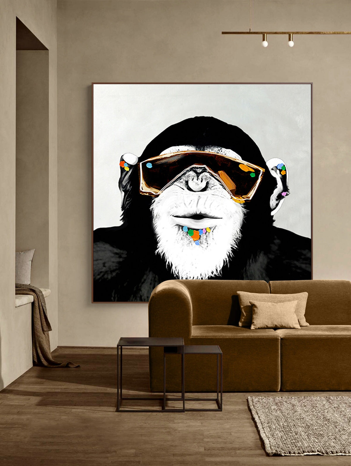 May include: A black and white illustration of a monkey wearing large, gold-rimmed sunglasses and a colorful beaded necklace. The monkey has a white beard and is looking directly at the viewer.