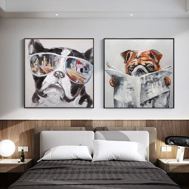 May include: Two square paintings of dogs. The painting on the left shows a black and white dog wearing blue sunglasses. The painting on the right shows a brown and white dog reading a newspaper.