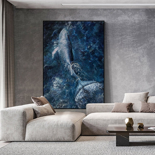 May include: A large, white whale breaches the surface of the ocean, creating a spray of water. The whale is silhouetted against a dark blue background, with a hint of light blue in the water.