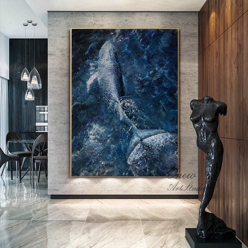 May include: Abstract painting of a whale breaching in a blue ocean. The painting has a textured, watercolor-like style. The whale is white and gray, and the ocean is a deep blue with white splashes of water.