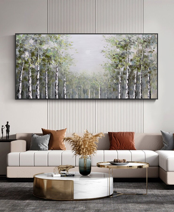 May include: A long, horizontal canvas painting depicting a forest scene with a row of birch trees in the foreground. The trees are painted in shades of green, white, and gray, with a soft, hazy background.