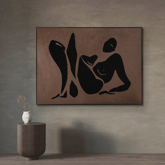 May include: Abstract art print featuring a black silhouette of a person in a reclining pose on a brown background.