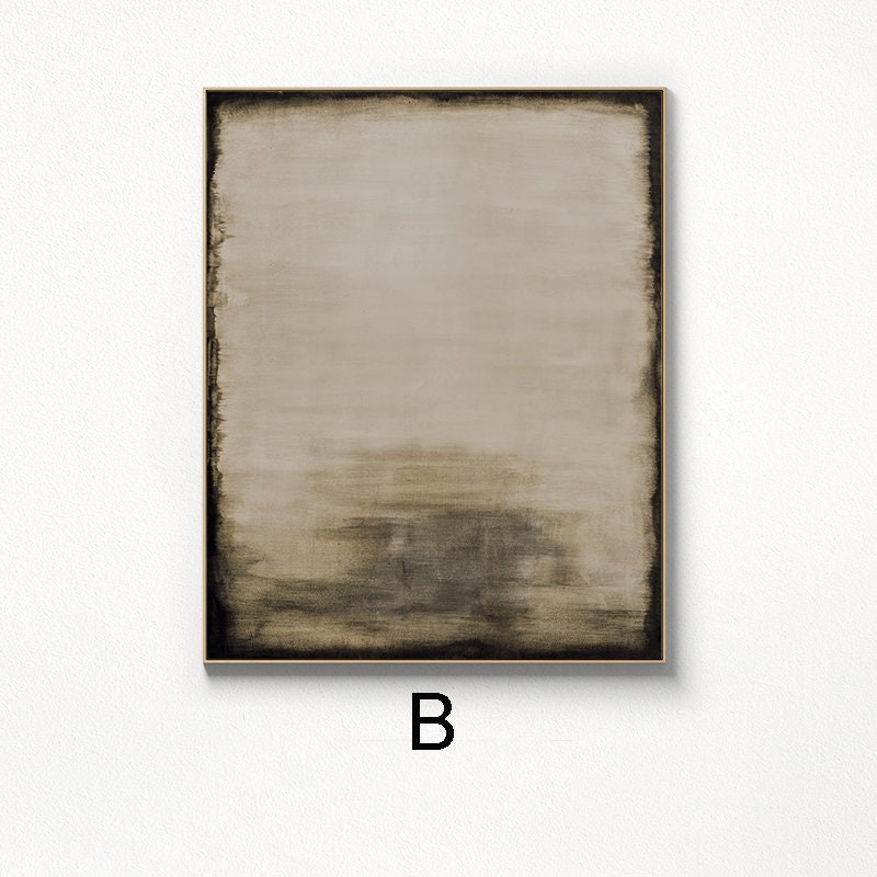 May include: Abstract painting with a brown and beige color scheme. The painting has a textured, brushstroke effect and is framed in a thin, gold frame.