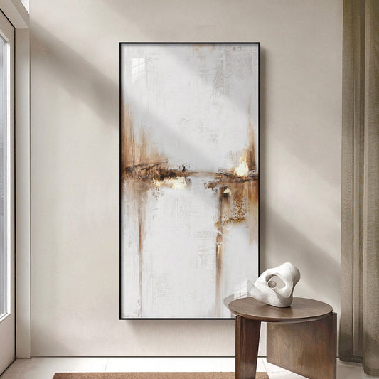 May include: Abstract painting with brown and white hues. The painting is framed in black and has a textured, brushstroke effect.