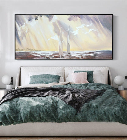 May include: A painting of two white sailboats on a body of water with a cloudy sky and sunbeams shining through the clouds.