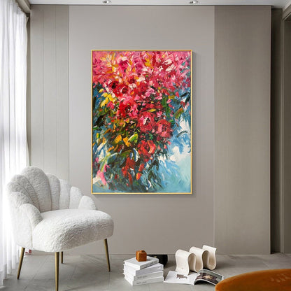 May include: Abstract painting of a bouquet of pink flowers with green leaves against a blue background.