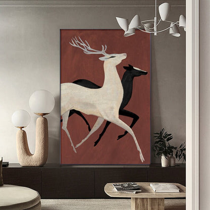 May include: A minimalist art print featuring two stylized deer running against a red background. The deer are white and black, with the white deer in the foreground and the black deer in the background.