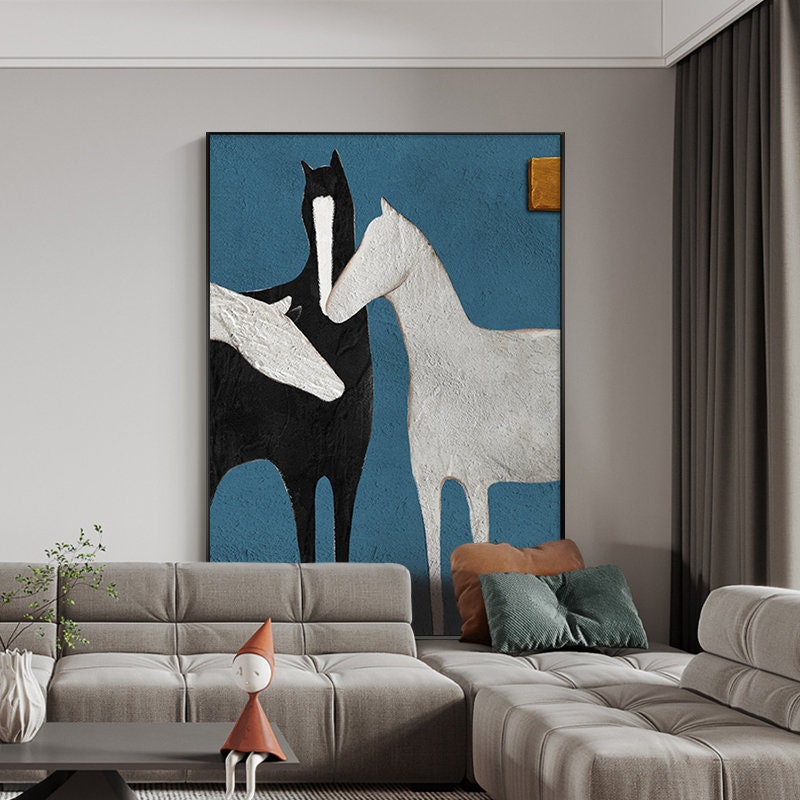 May include: Abstract painting of three horses in black, white, and gray against a blue background. The horses are stylized and have a textured appearance.