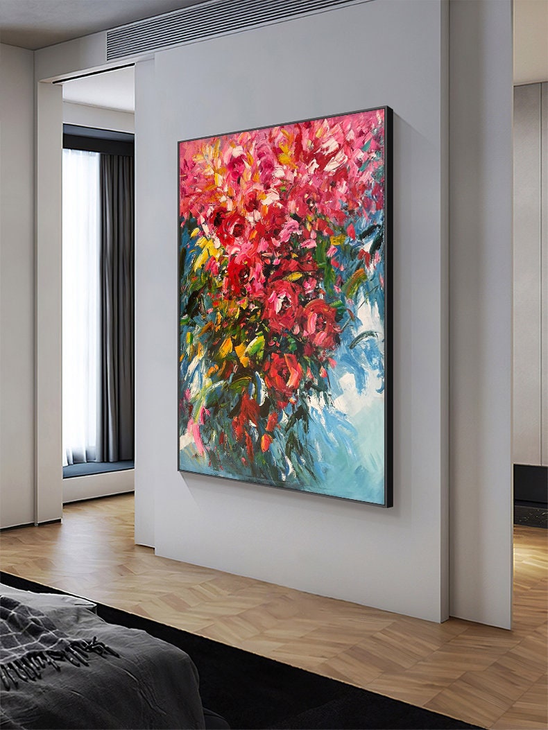 May include: A colorful abstract painting of a bouquet of pink flowers with green leaves and a blue background.