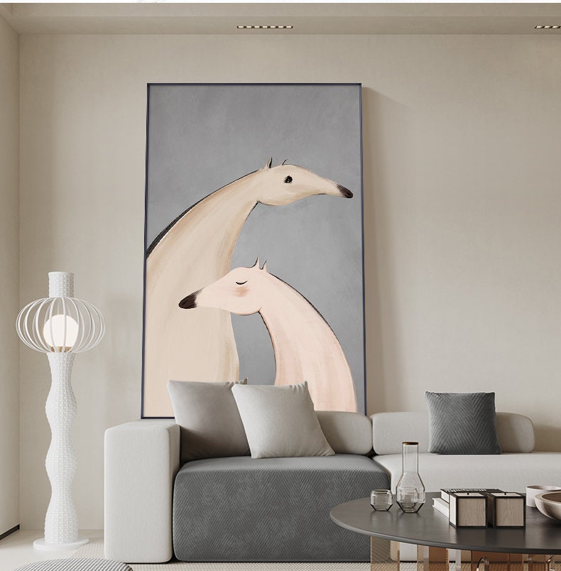May include: A painting of two stylized dogs in shades of beige and pink against a light gray background. The dogs are depicted in a close embrace, with one dog's head resting on the other's shoulder.