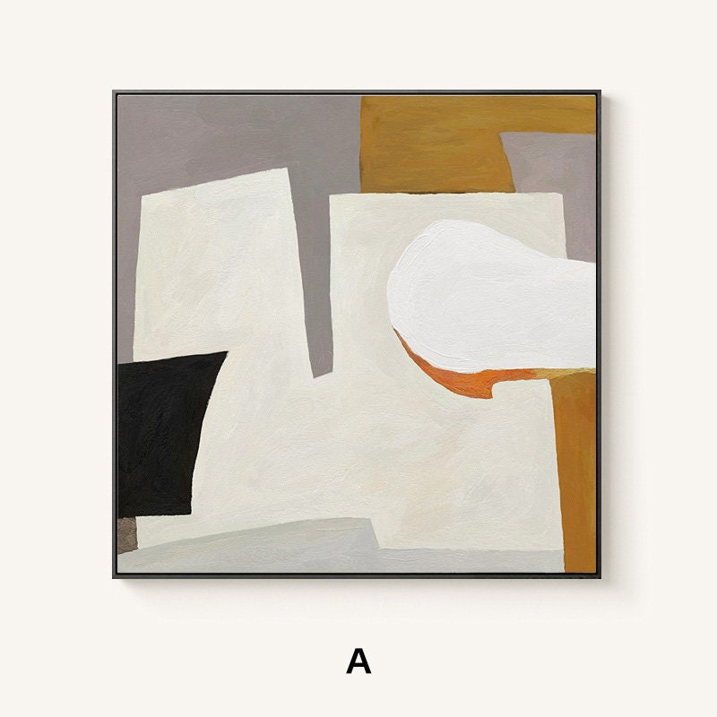 May include: Abstract painting with geometric shapes in shades of gray, white, black, orange, and brown. The painting is framed in a black frame.