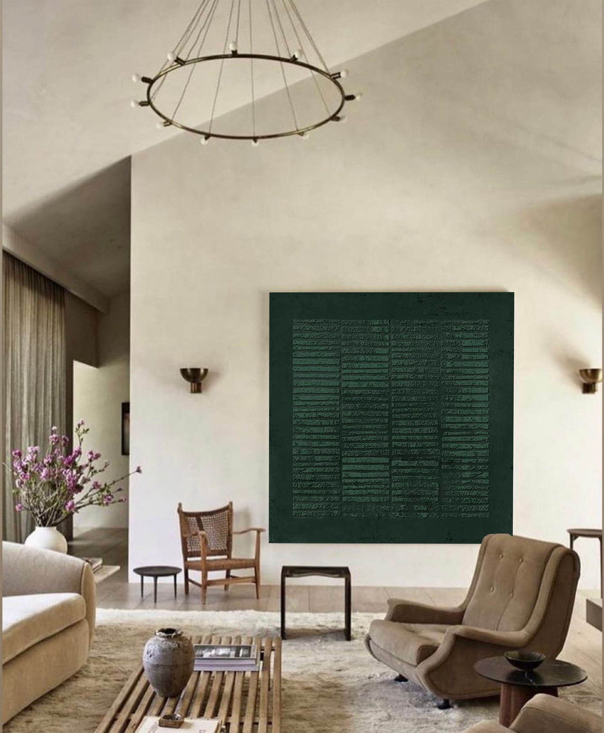 May include: A living room interior with a large dark green abstract painting on the wall, a brown leather armchair, a wooden coffee table, and a white couch.