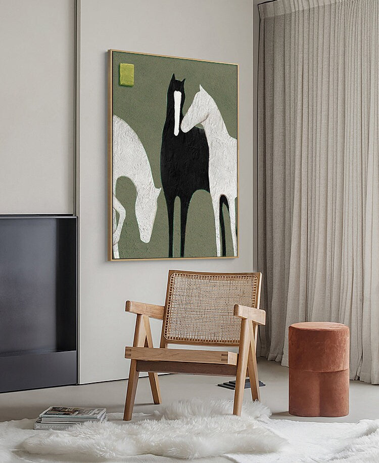 May include: A painting of three horses on a green background. The horses are stylized and simplified, with two white horses and one black horse. The black horse is in the center of the painting, with the white horses on either side.