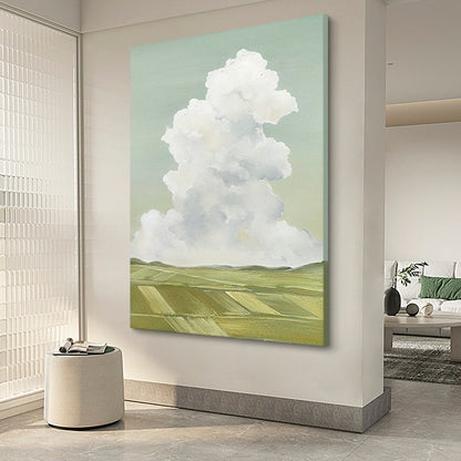 May include: A painting of a large, fluffy white cloud in a light blue sky over a green field. The field is divided into sections by rows of green and yellow.